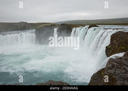 The Godafoss (waterfall of the gods) is a famous waterfall in Iceland. The breathtaking landscape of Godafoss waterfall attracts tourist to visit the Stock Photo
