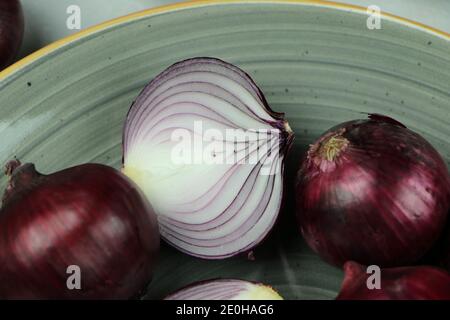 sweet red onions on background Stock Photo