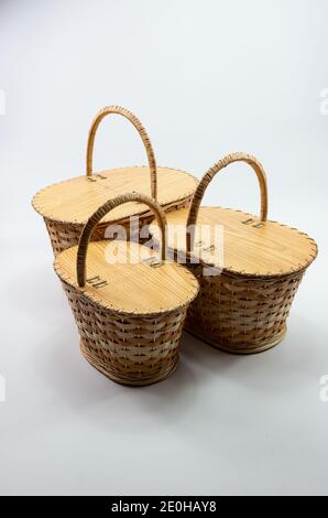 Weaver hand-made wicker basket with lid, good job Stock Photo