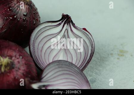 sweet red onions on background Stock Photo
