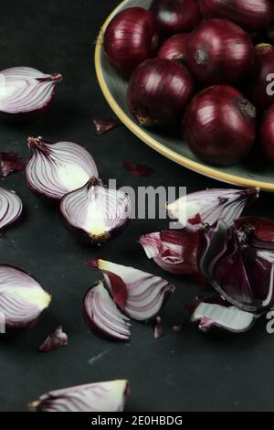 sweet red onions on background Stock Photo