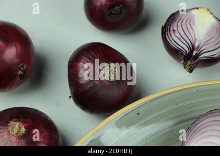 sweet red onions on background Stock Photo