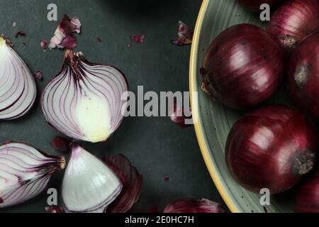 sweet red onions on background Stock Photo