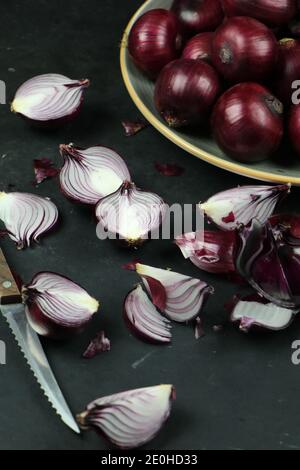 sweet red onions on background Stock Photo