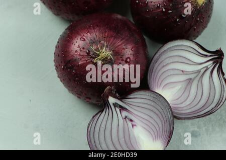 sweet red onions on background Stock Photo