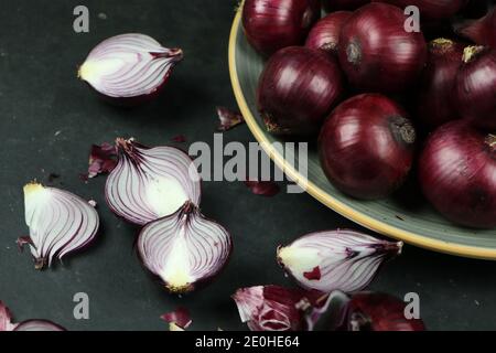 sweet red onions on background Stock Photo