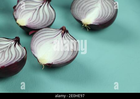 sweet red onions on background Stock Photo
