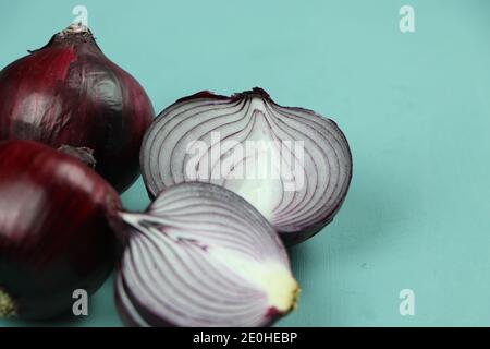 sweet red onions on background Stock Photo