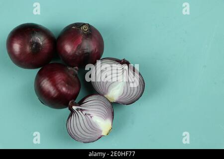 sweet red onions on background Stock Photo