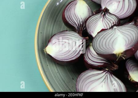 sweet red onions on background Stock Photo