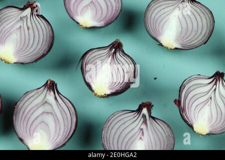 sweet red onions on background Stock Photo