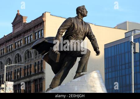 A statue of Adam Clayton Powell Jr. by Branly Cadet installed in the plaza of the Harlem State Office Building in New York, NY. Stock Photo