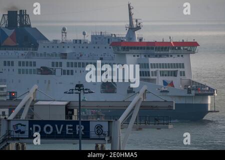 Dover, UK. 1st Jan, 2021. Ferries arrive largely empty - New year's day and the transition period for Brexit is over so new rules apply at ferry border in Dover. Coronavirus add an extra challenge as all travellers through the port must have a current Covid test as well. This is a result of much of England no being in Tier 4. Credit: Guy Bell/Alamy Live News Stock Photo