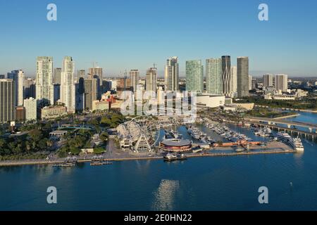 Miami, Florida - December 27, 2020 - Aerial view of Bayside Marketplace, City of Miami Marina and Miami skyline on sunny winter morning. Stock Photo