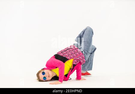 girl in a breakdance pose Stock Photo