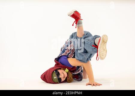 girl in a breakdance pose Stock Photo