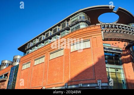 Facade of a renovated building of an old brewery in the city of Poznan Stock Photo