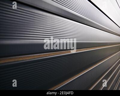 Background of a closed black window blind Stock Photo