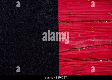 black glitter.Red Painted Wood. painted old wooden wall. black Wood red plank background Stock Photo
