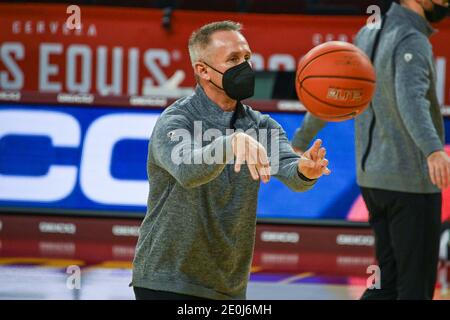 Colorado Buffaloes assistant coach Bill Grier assists players before an NCAA basketball game against the Southern California Trojans, Thursday, Dec. 3 Stock Photo