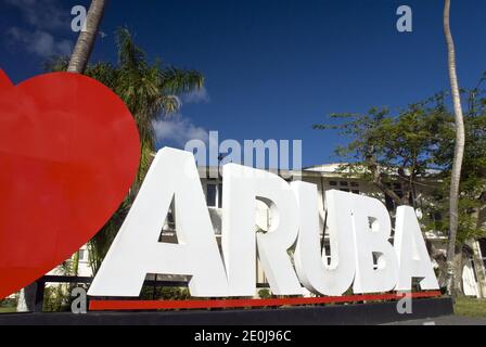 A large 'I Love Aruba' sign stands in downtown Oranjestad, Aruba. Stock Photo