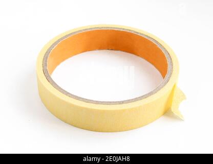 Yellow sticky tape roll isolated on white. Duct tape close-up Stock Photo