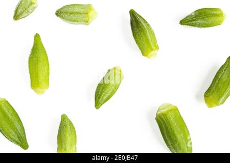 Flat lay texture made of green okra vegetables isolated on white background Stock Photo