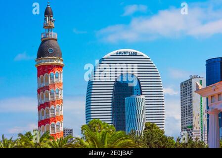 Public Service Hall (House of Justice) in the front and Hotel Courtyard Marriott in the back, and Tower Restaurant in Italian Venetian style, Batumi, Stock Photo