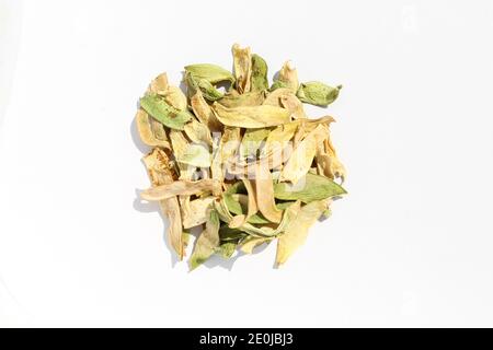 Pile of dried string beans isolated on white background. Colorful meal ingredient Stock Photo