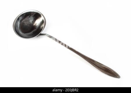 Metallic shiny ladle isolated on white background. Dipper Stock Photo