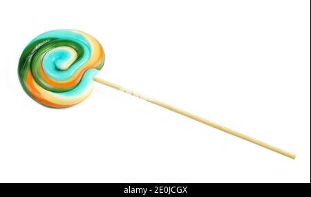Colorful circle shaped lollipop isolated on white background. Delicious sucker on wooden stick Stock Photo