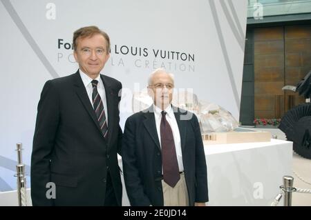 Louis Vuitton designer Marc Jacobs, LVMH's CEO Bernard Arnault and Yves  Carcelle, president of LVMH Fashion Group during the press conference to  announce the creation of a cultural foundation 'Louis Vuitton Pour