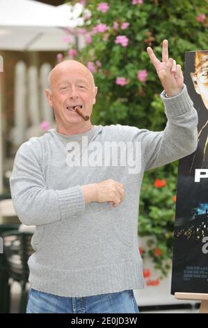 Hollywood director Tony Scott, famous for films including Top Gun, has died after jumping from a bridge in Los Angeles, the authorities have said. The Los Angeles County Coroner's office said Scott's death was being investigated as a suicide. British-born Scott, brother of Alien director Ridley, shot to fame in the 1980s with a string of action films. The 68-year-old's blockbuster hits included Crimson Tide, Days of Thunder and Beverly Hills Cop II. File photo : British director Tony Scott poses for a photocall to present his movie 'The taking of Pelham 123', a remake of the 1974 version in Pa Stock Photo