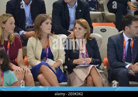 Princesses Eugenie and Princess Beatrice watching the swimming