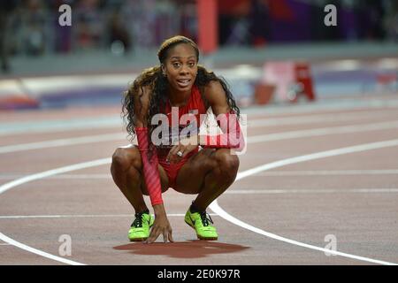 USA's Sanya Richards-Ross celebrates after her victory in the Women's 400m  final, USA's DeeDee Trotter