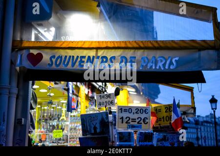 A colorful souvenir and gift shop in the Latin Quarter of Paris France in the early evening. Stock Photo