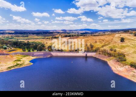 Dam on FIsh river at Lake Oberon - green renewable energy and Hydro scheme of NSW, Australia - aerial view. Stock Photo