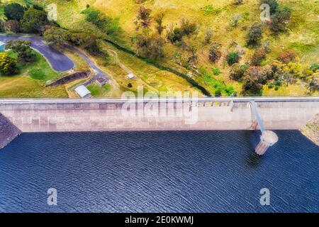 Think concrete dam on Oberon Lake crossing Fish river - aerial top down view. Stock Photo