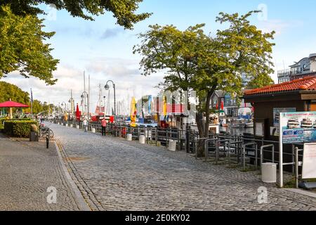 The picturesque strand boardwalk in the resort city of Warnemunde, Germany, on the coast of the Baltic Sea. Stock Photo