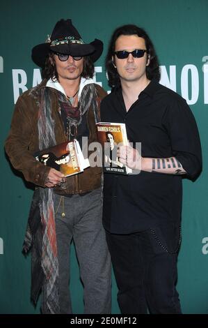 Johnny Depp and Damien Echols participate in a book discussion for Echols' book 'Life after Death' at Barnes & Noble Union Square in New York City, NY, USA on September, 21 2012. Photo by Brad Barket/ABACAPRESS.COM Stock Photo