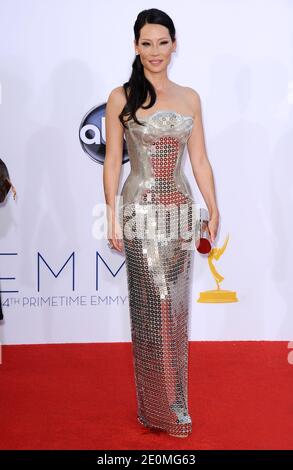 Lucy Liu arrives at the 64th Annual Primetime Emmy Awards at Nokia Theatre L.A. Live in Los Angeles, CA, USA on September 23, 2012. She is wearing a Versace dress. Photo by Lionel Hahn/ABACAPRESS.COM Stock Photo