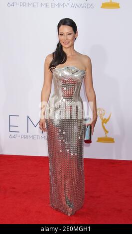 Lucy Liu arriving for The 64th Annual Primetime Emmy Awards held at the Nokia Theatre, L.A. Live in Los Angeles, CA, USA on September 23, 2012. She is wearing a Versace dress. Photo by Baxter/ABACAPRESS.COM Stock Photo