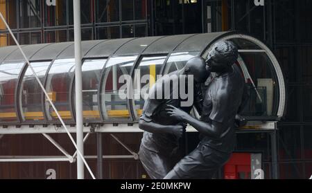 A bronze sculpture by Algerian artist Adel Abdessemed is on display in front of the Centre Pompidou contemporary art center, aka Beaubourg in Paris, France, September 26, 2012. The sculpture immortalizes the 'headbutt' given by the French former football champion Zinedine Zidane to Italian player Materazzi during the World Cup final in 2006. The Centre Pompidou will dedicate a retrospective to Abdessemed from October 3, 2012 to January 7, 2013. Photo by Mousse/ABACAPRESS.COM Stock Photo