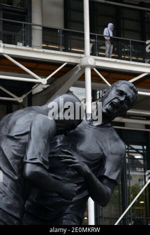 A bronze sculpture by Algerian artist Adel Abdessemed is on display in front of the Centre Pompidou contemporary art center, aka Beaubourg in Paris, France, September 26, 2012. The sculpture immortalizes the 'headbutt' given by the French former football champion Zinedine Zidane to Italian player Materazzi during the World Cup final in 2006. The Centre Pompidou will dedicate a retrospective to Abdessemed from October 3, 2012 to January 7, 2013. Photo by Mousse/ABACAPRESS.COM Stock Photo