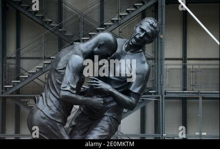 A bronze sculpture by Algerian artist Adel Abdessemed is on display in front of the Centre Pompidou contemporary art center, aka Beaubourg in Paris, France, September 26, 2012. The sculpture immortalizes the 'headbutt' given by the French former football champion Zinedine Zidane to Italian player Materazzi during the World Cup final in 2006. The Centre Pompidou will dedicate a retrospective to Abdessemed from October 3, 2012 to January 7, 2013. Photo by Mousse/ABACAPRESS.COM Stock Photo