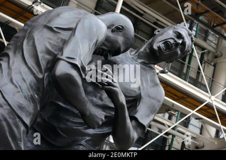 A bronze sculpture by Algerian artist Adel Abdessemed is on display in front of the Centre Pompidou contemporary art center, aka Beaubourg in Paris, France, September 26, 2012. The sculpture immortalizes the 'headbutt' given by the French former football champion Zinedine Zidane to Italian player Materazzi during the World Cup final in 2006. The Centre Pompidou will dedicate a retrospective to Abdessemed from October 3, 2012 to January 7, 2013. Photo by Mousse/ABACAPRESS.COM Stock Photo