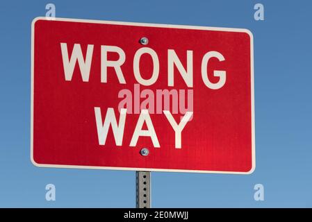 Closeup of a sign that warns drivers they are going the wrong way. Stock Photo