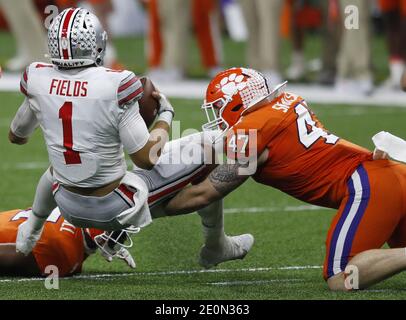 Allstate Sugar Bowl - Ohio State quarterback Justin Fields is all smiles  after being name the Offensive Player of the Game for the Playoff Semifinal  at the Allstate Sugar Bowl against the