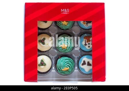 Box of M&S 9 mini festive cupcakes isolated on white background - ideal for Christmas Xmas Stock Photo