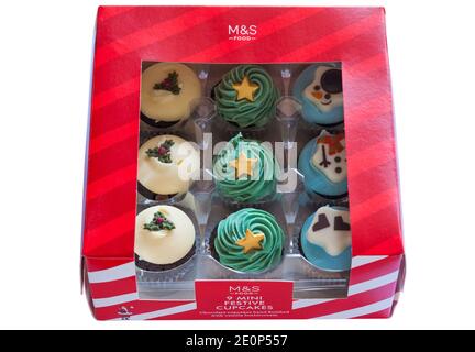 Box of M&S 9 mini festive cupcakes isolated on white background - ideal for Christmas Xmas Stock Photo